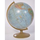 A 20th century Danish Phillips terrestrial polyglobe / desk top globe being raised on a circular