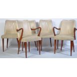 A set of 8 1950's mid century retro dining chairs by Ronald E Long for RS Stevens Ltd. Raised on