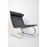 After Poul Kjaerholm, a stunning black leather and polished steel PK20 armchair / chair. Raised on