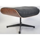 After Charles & Ray Eames. A Herman Miller  671 Ottoman raised on polished quadruped swivel base