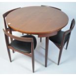 A superb 1960's Danish teak dining table and dining chairs designed by Hans Olsen for Frem Rojle.