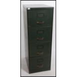 A 1950's mid century green metal 4 drawer filing cabinet with coachlined detail to the drawer fronts