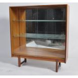 Mid-century Danish inspired teak mirror backed glass display cabinet on graudrille style legs in the