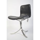 After Poul Volther. A stunning black leather and polished steel open armchair. The splayed