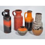 A collection of 1970's German ' Fat Lava ' type ceramics to include vibrant colours to the jugs /
