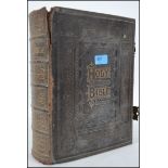A large 19th century leather and gilt tooled Bible