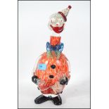 An unusual mid century Murano glass clown bottle d