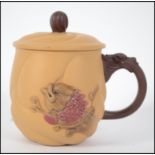 A 20th century terracotta  Yixing lidded teacup ha