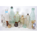 A collection of bottles, ink pots etc. Dating from