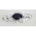 A vintage silver and black onyx brooch of Celtic s