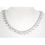 A 1950s white rhinestone necklace in a silver tone