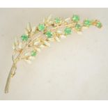 A large vintage 1950s rhinestone and enamel brooch