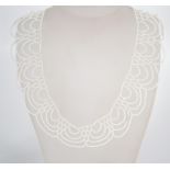 A vintage 1960s white glass seed bead necklace hav