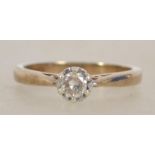 A ladies 9ct gold and diamond ring having a centra