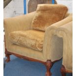 A good pair of antique style armchairs raised on c