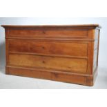 A 19th century French fruitwood twin pedestal desk