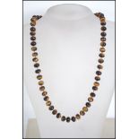 A 20th century ladies agate stone bead carved neck