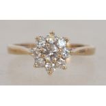 A 9ct gold and diamond flower head cluster ring ap