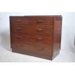 A 1940's Air Ministry mahogany chest being raised