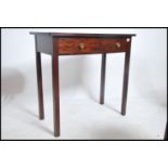 A 19th century bow front mahogany writing table de