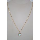 A hallmarked 9ct gold pendant necklace strung with