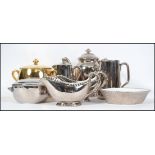 A Royal Worcester silver lustre wear tea service consisting of tea pot, water pot, creamer etc along