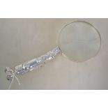 A good contemporary silver plated magnifying glass