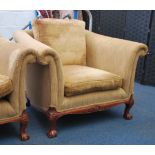 A good pair of antique style armchairs raised on c