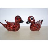 A pair of 20th century studio glass Murano sculptu