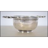 A Harrods silver hallmarked tea strainer  having t