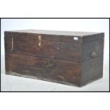 An early 20th century oak blanket box chest having