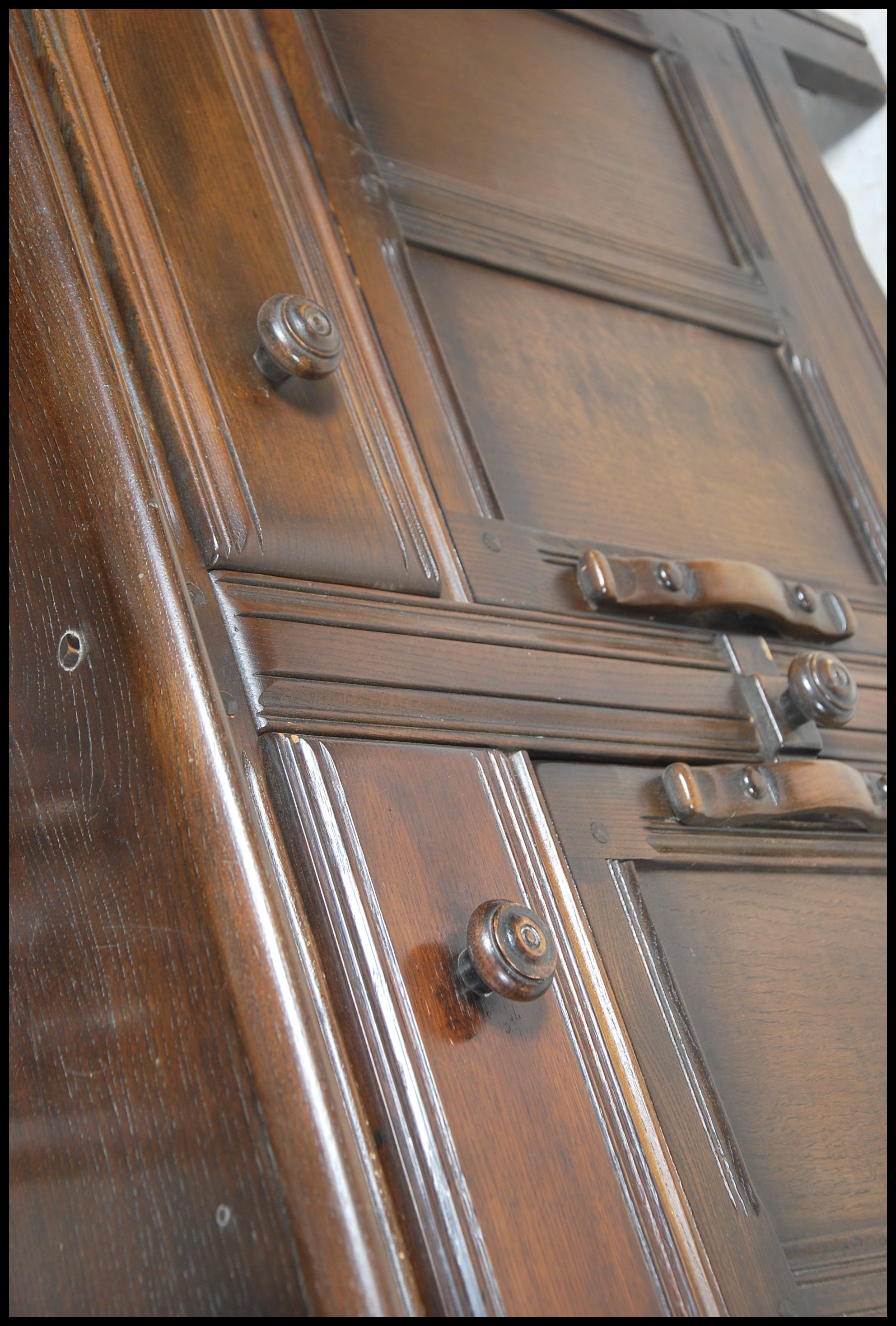 A 20th century Ercol court cupboard in beech and e - Image 5 of 5