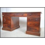 A good sized Victorian mahogany twin pedestal desk