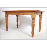 A 20th century antique country style pine dining t