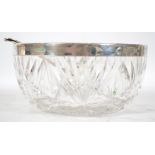 A silver hallmarked cut glass salad bowl and spoon