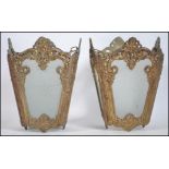 A pair of mid to late century gilt metal rococo an