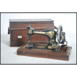 A vintage Singer Sewing machine  having hand crank