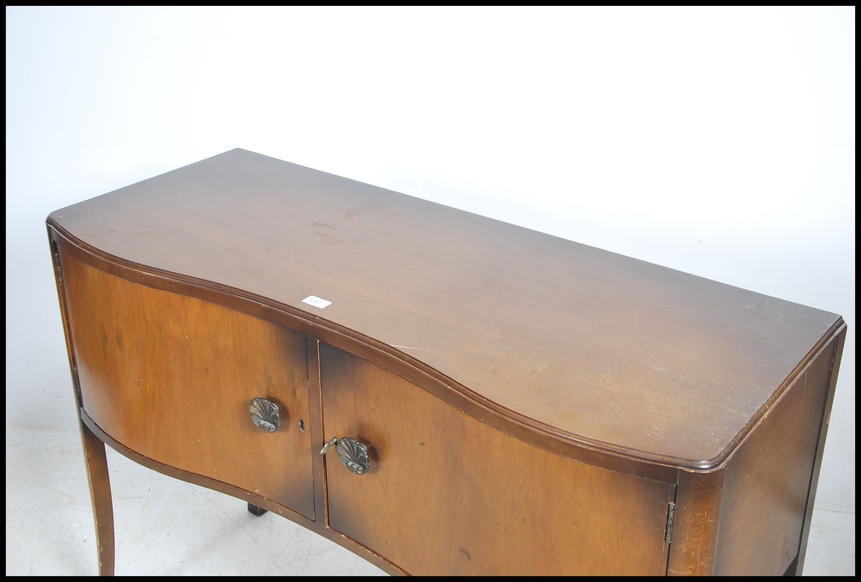 A 1950's post war Art Deco sideboard raised on ser - Image 2 of 4
