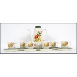 A retro 1960's  Chartwell coffee service decorated with roses stamped to base consisting of cups,