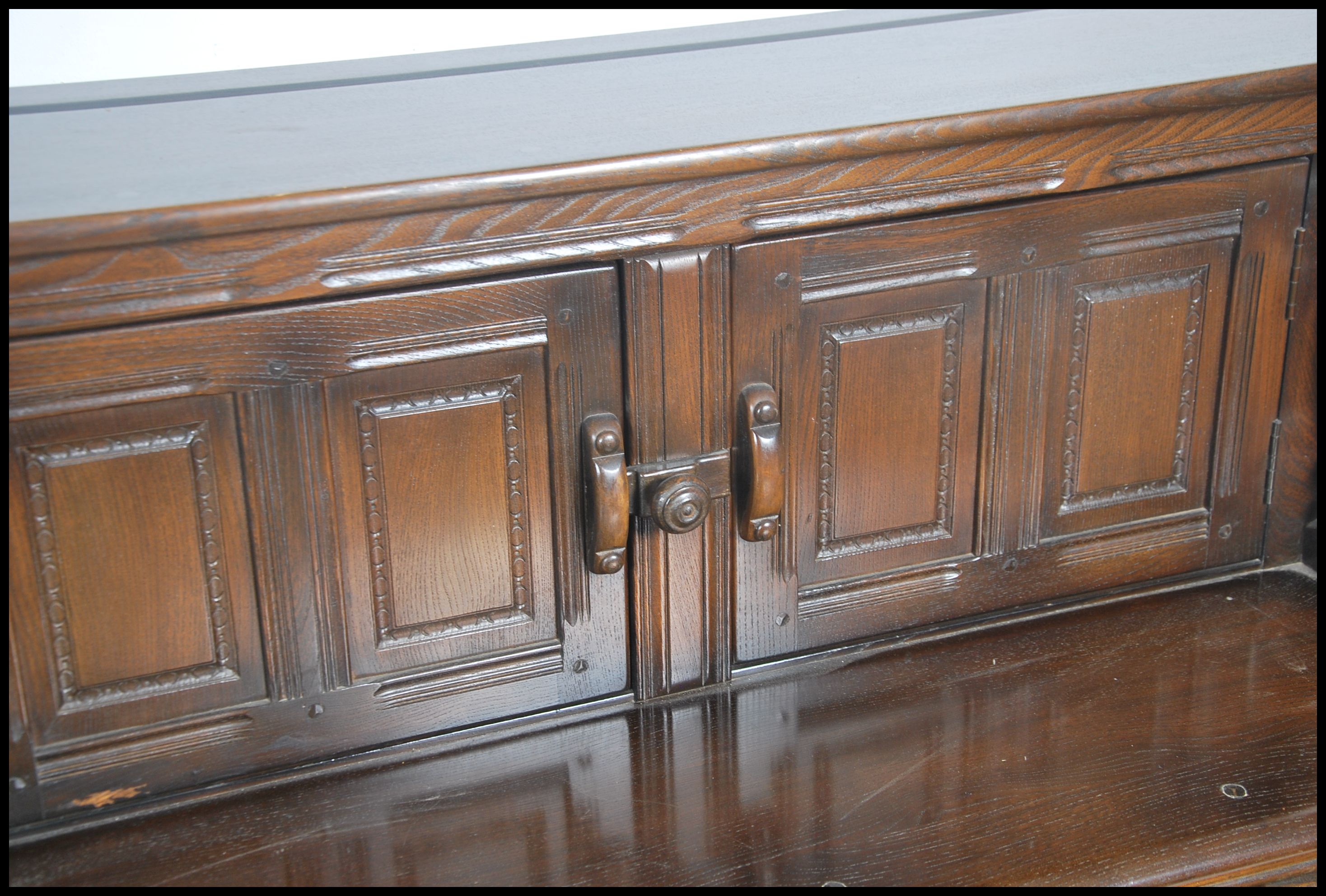 A 20th century Ercol court cupboard in beech and e - Image 3 of 5
