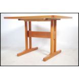 A 1970's retro Danish teak and tile top dining tab