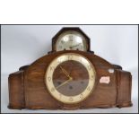 A 1930's Art Deco large Westminster Chime mantel clock together with an Ansonia early 20th century
