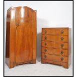 A 1930's Art Deco walnut 3 piece bedroom suite comprising the chest of drawers with matching