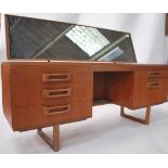 A 1970's retro teak wood dressing table in the man