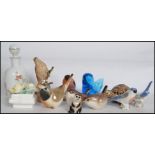 A good group of miniature ceramic animals to include a Royal Worcester 3238 Bullfinch, wrens,