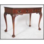 A Queen Anne revival mahogany writing table desk b