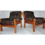 A retro pair of Scandinavian brown leather upholst
