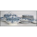 A 19th century Bristol Pountney blue and white part dinner service to include large and small