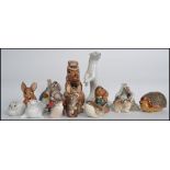 A collection of ceramic animal figures by various makers to include Royal Copenhagen, USSR,