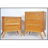 A 1930's Art Deco oak chest of drawers and matching dressing table, each being raised on tapering